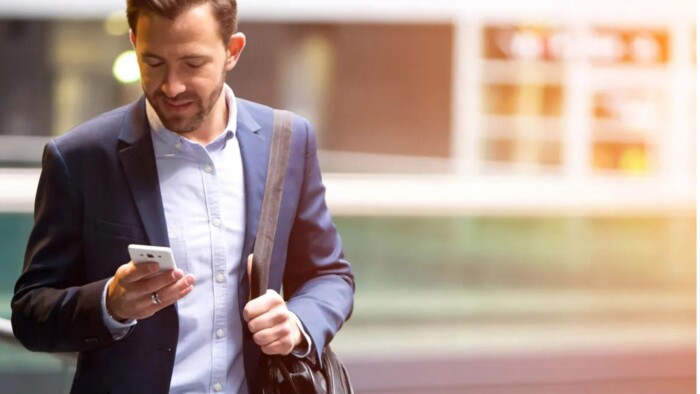 A Man Using a Rental Phone in Italy