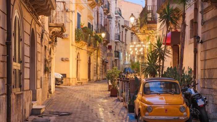 A Yellow Cab in the streets of Italy 